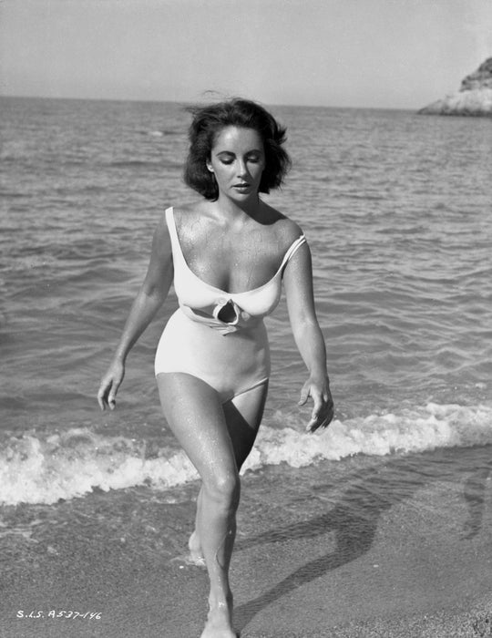 Liz Taylor Running on the Beach