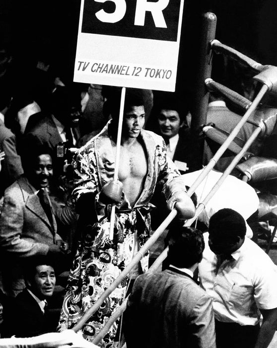 Muhammad Ali Holding Sign for Tokyo Match