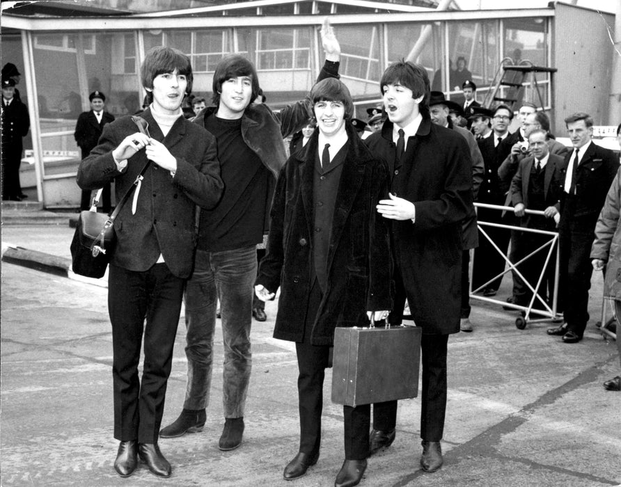 The Beatles at an Airport in 1965