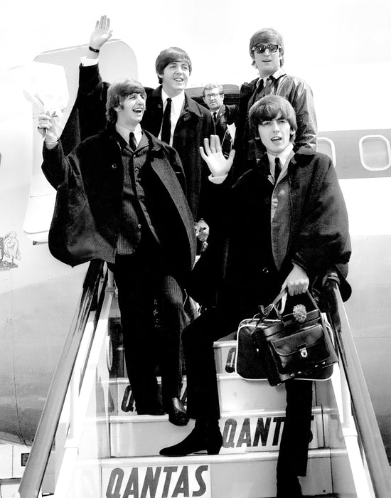 The Beatles arriving in London, 1964