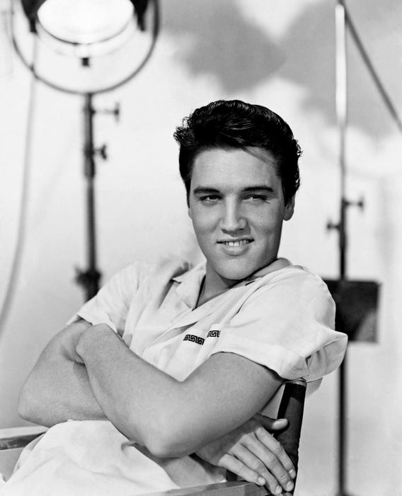 Elvis Presley Smiling in Studio Chair