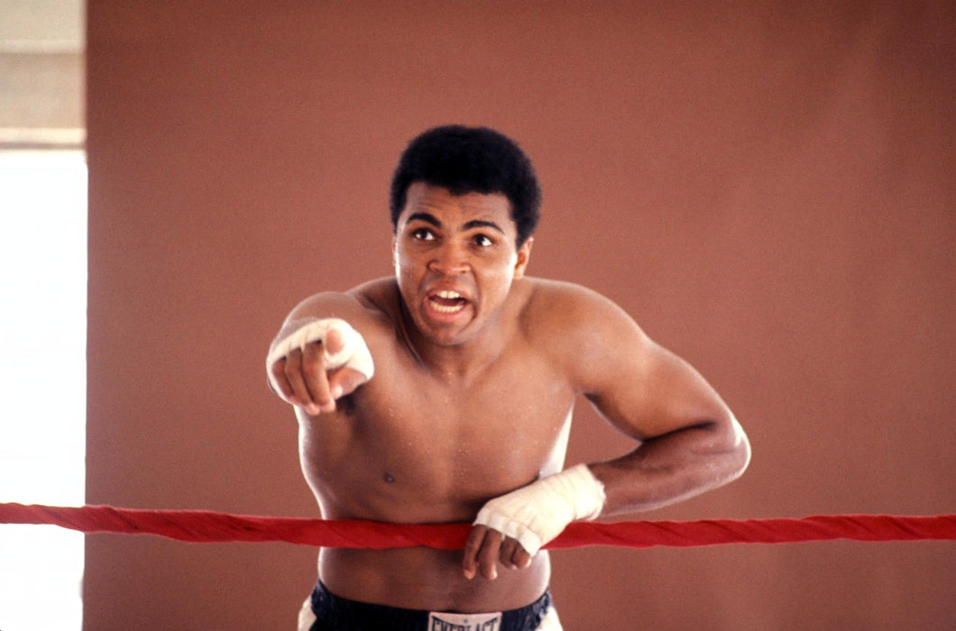 Young Muhammad Ali Holding Pointing from Ring