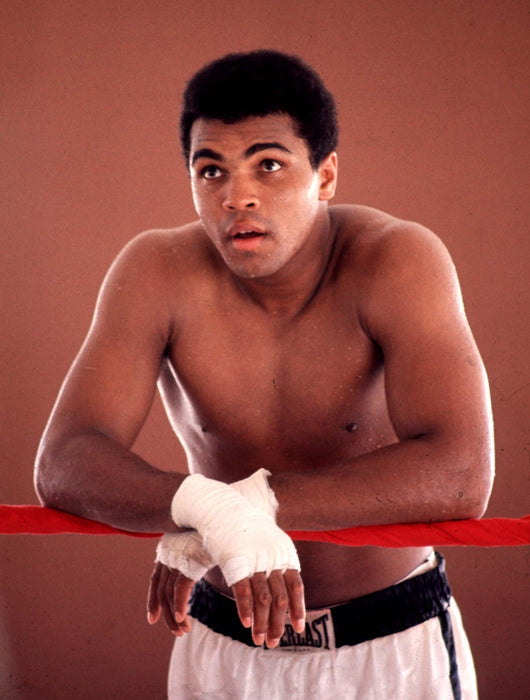 Young Muhammad Ali Holding onto Ring Portrait