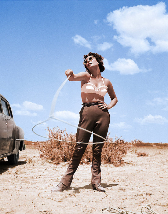 Liz Taylor with Lasso on Set of Giant by Frank Worth