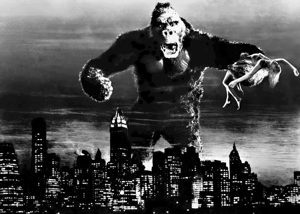 King Kong Carrying Woman over City