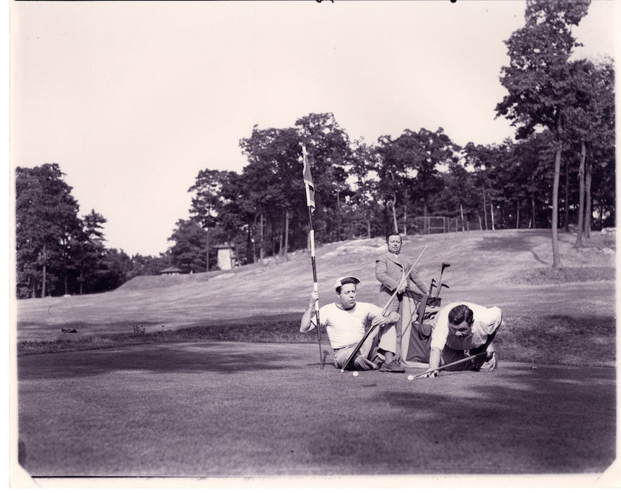 Babe Ruth with a Billard Cue on the Golf Course